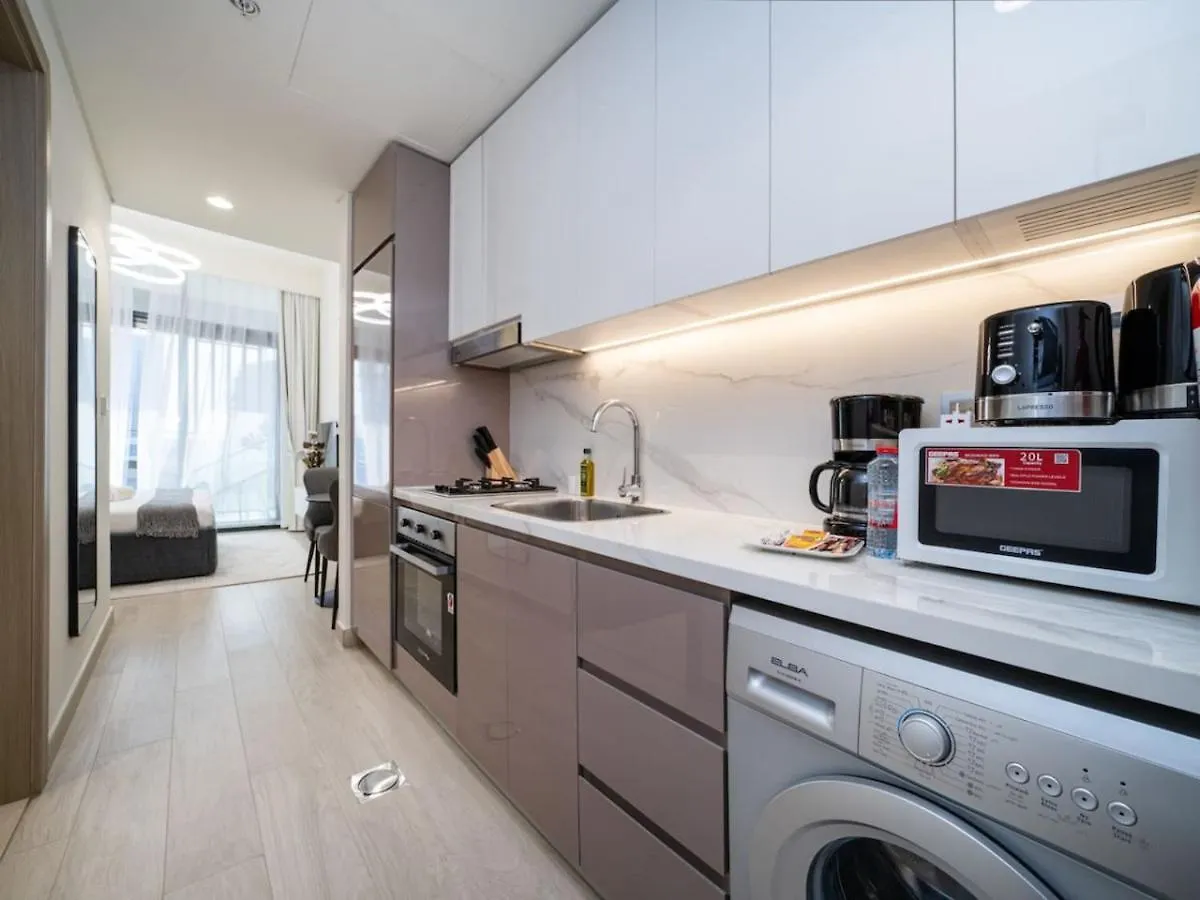 Cosy Azizi Riviera Studio Retreat With City Views Дубай Апартаменты